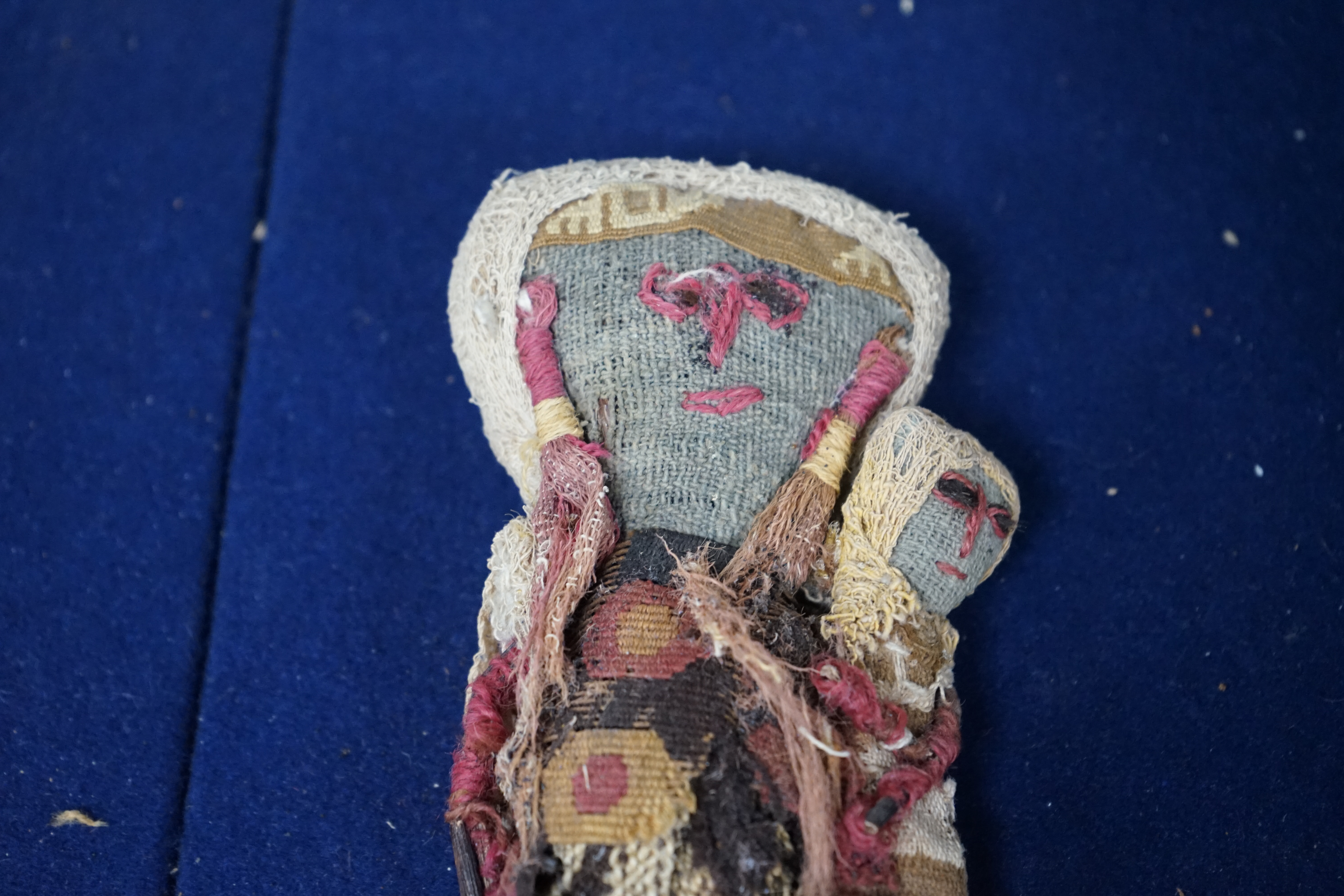 A pre Columbian textile doll, 20cm. Condition - worn as expected